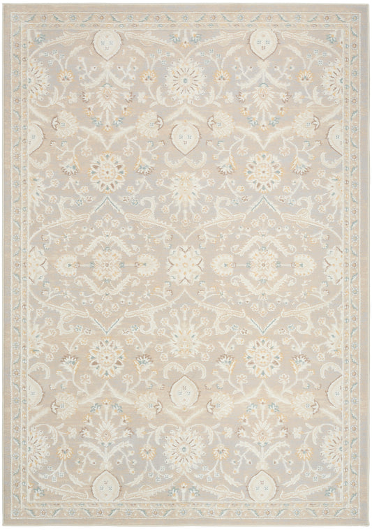 Rectangular traditional oriental rug in beige with ivory floral damask pattern and pale blue border accents.