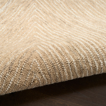 Beige textured runner rug with chevron looped pile and folded edge on dark wood floor