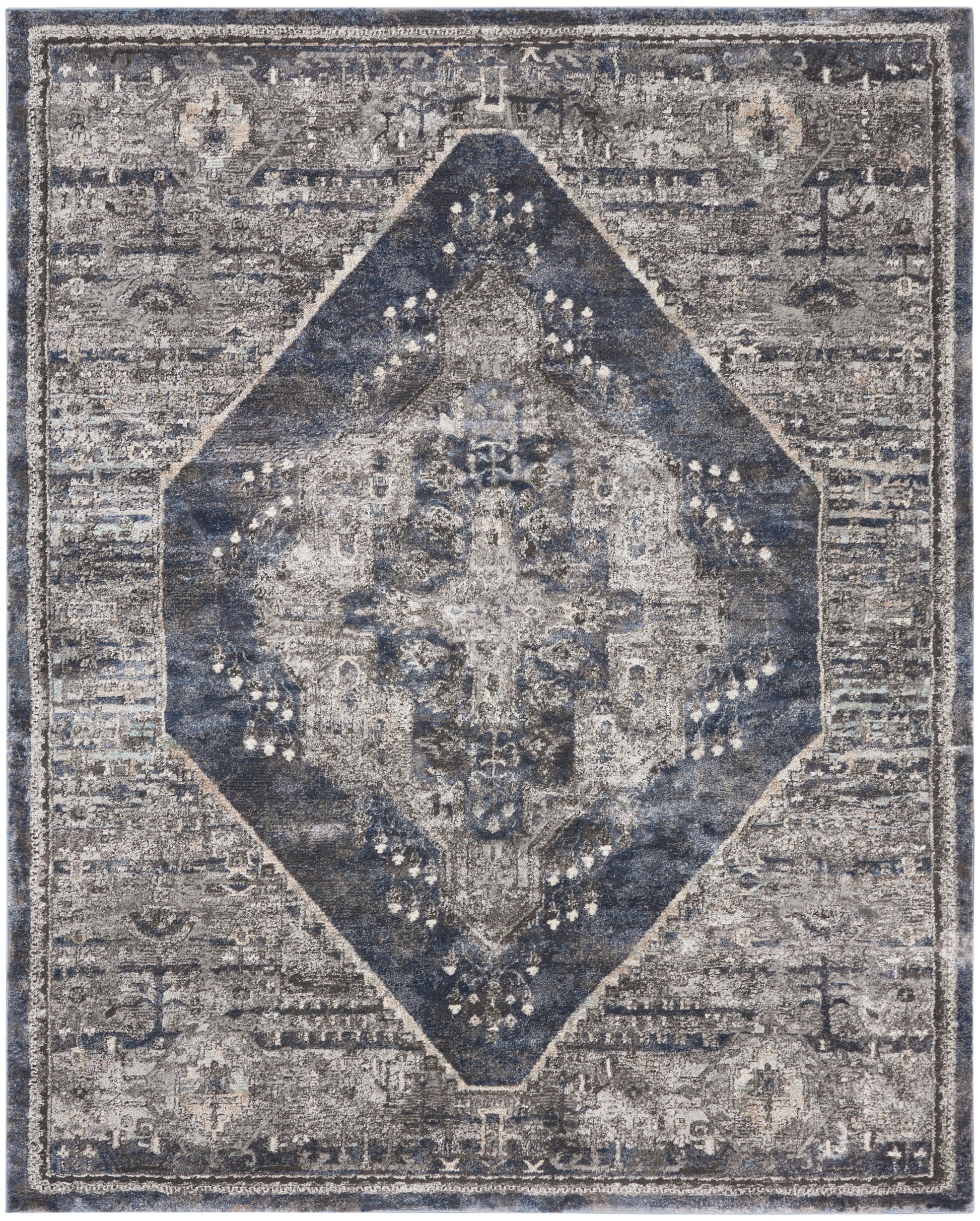 Distressed vintage-style rug with a navy blue diamond medallion on a gray field and faded ornate borders.