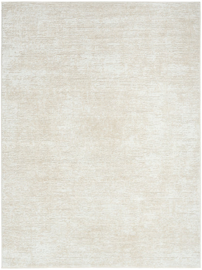 Cream ivory textured rug with a soft, mottled surface and subtle beige tones.