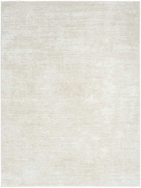 Cream ivory textured rug with a soft, mottled surface and subtle beige tones.