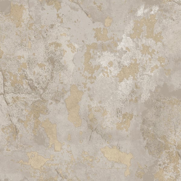 Beige and cream peeling plaster wall with mottled, distressed texture and gold-toned patches.