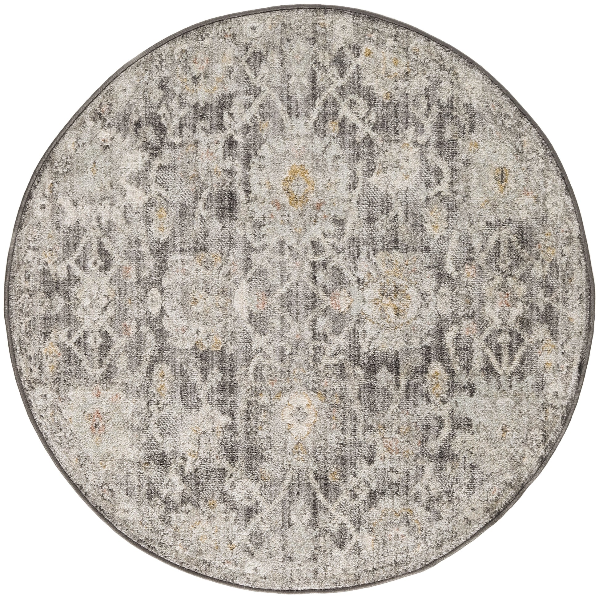 Round gray distressed rug with faded floral pattern and subtle yellow accents.