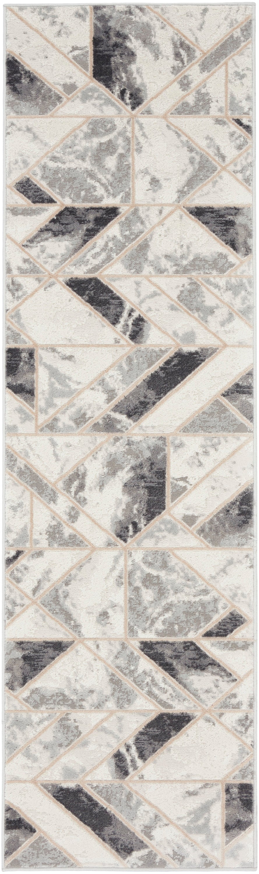 Vertical geometric mosaic tile pattern in beige, cream and gray triangles with terrazzo texture.