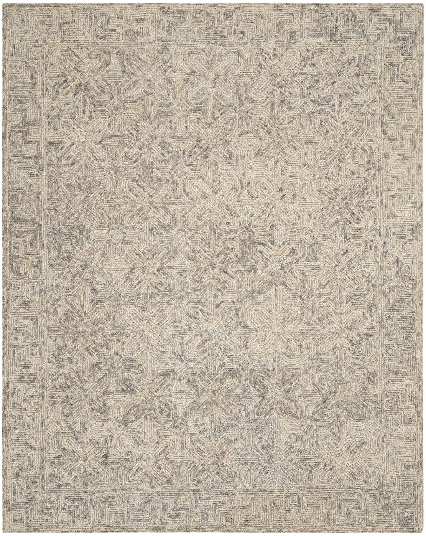 Neutral beige-gray woven area rug with faded geometric medallions and a Greek-key border.