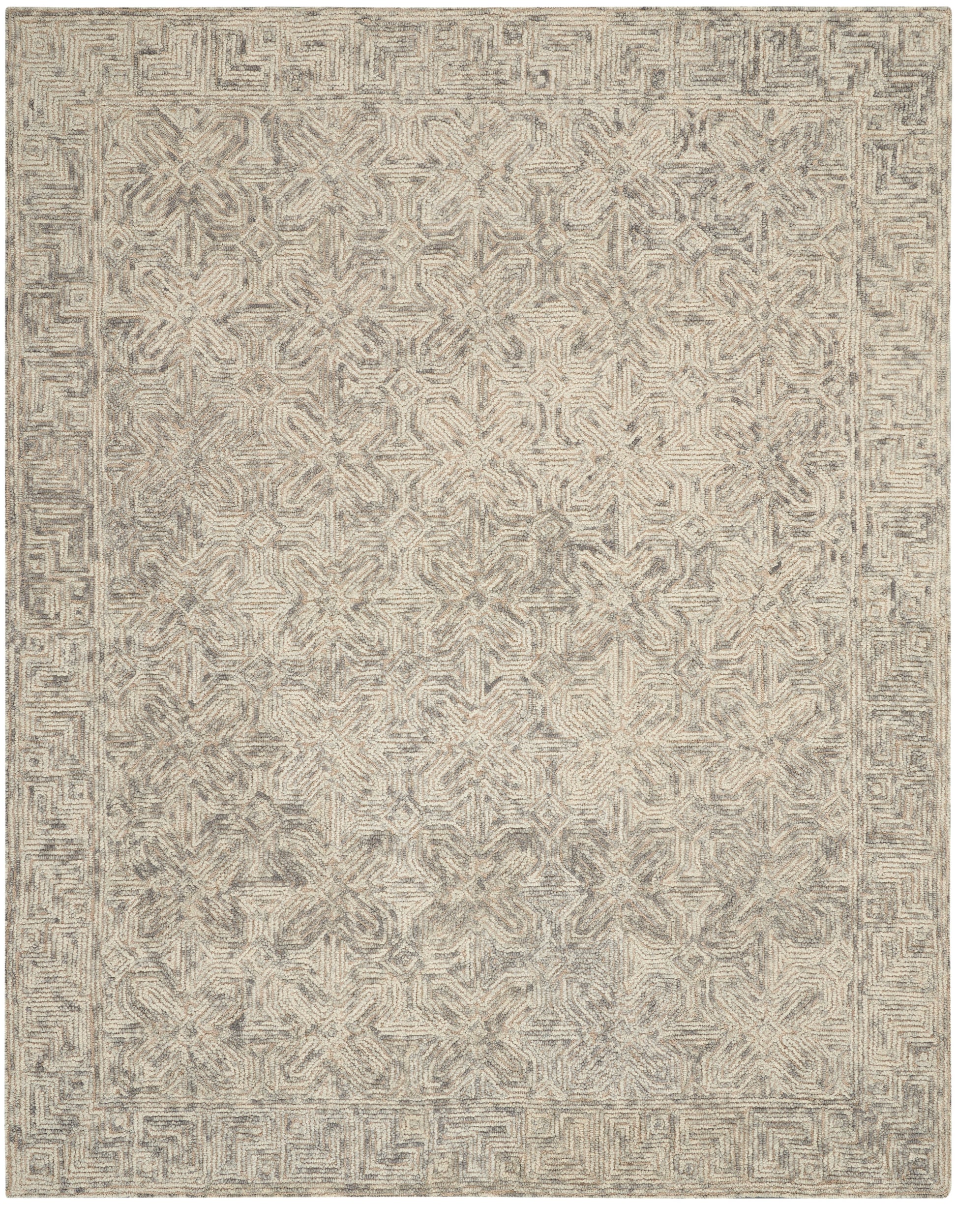 Neutral beige-gray woven area rug with faded geometric medallions and a Greek-key border.