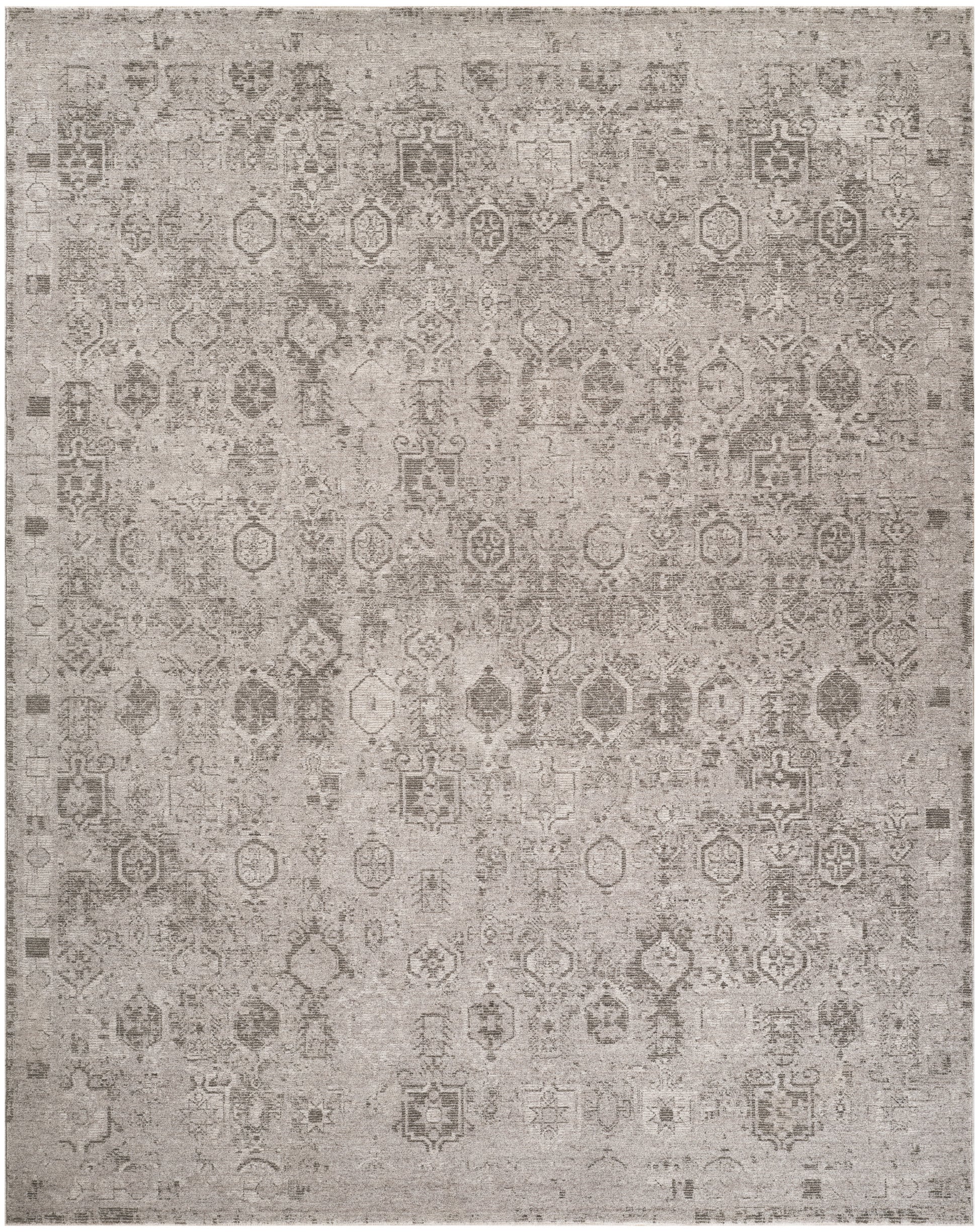 Distressed beige-gray oriental rug with faded medallion motifs; vintage-inspired, soft pile, neutral living room accent.