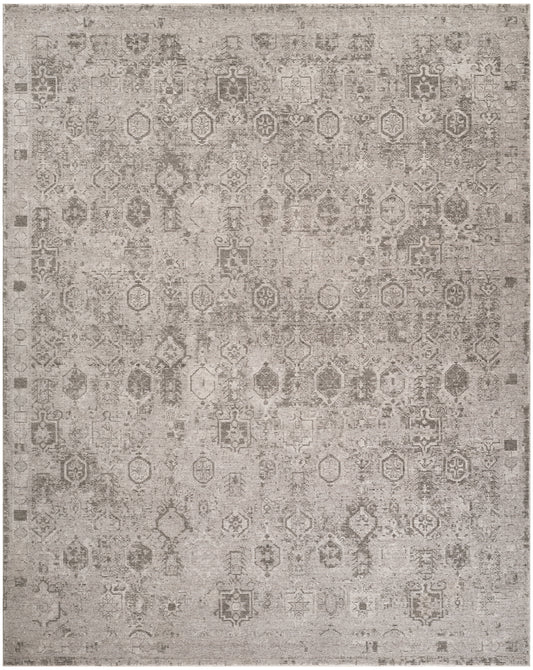 Distressed beige-gray oriental rug with faded medallion motifs; vintage-inspired, soft pile, neutral living room accent.