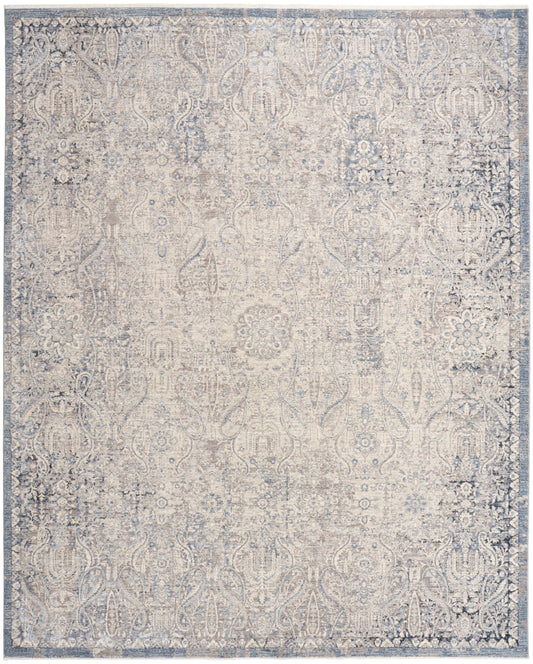 Blue-gray and ivory distressed floral rug with ornate border; vintage Persian-inspired woven area rug.