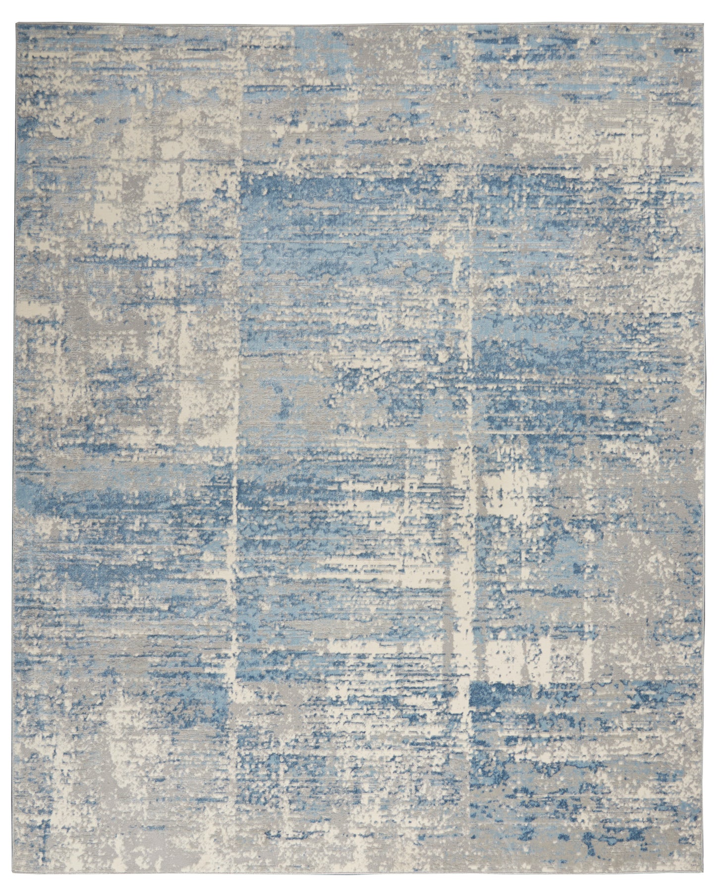 Rectangular modern area rug in blue, gray & beige with a distressed patchwork pattern.