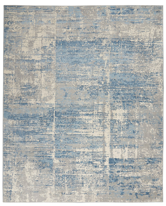 Rectangular modern area rug in blue, gray & beige with a distressed patchwork pattern.
