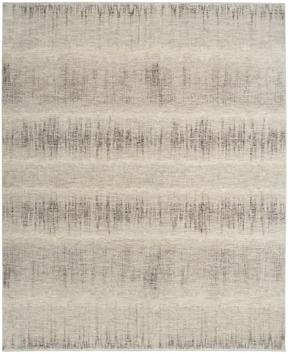 Neutral beige area rug with subtle taupe horizontal bands and distressed texture for a soft, modern look.
