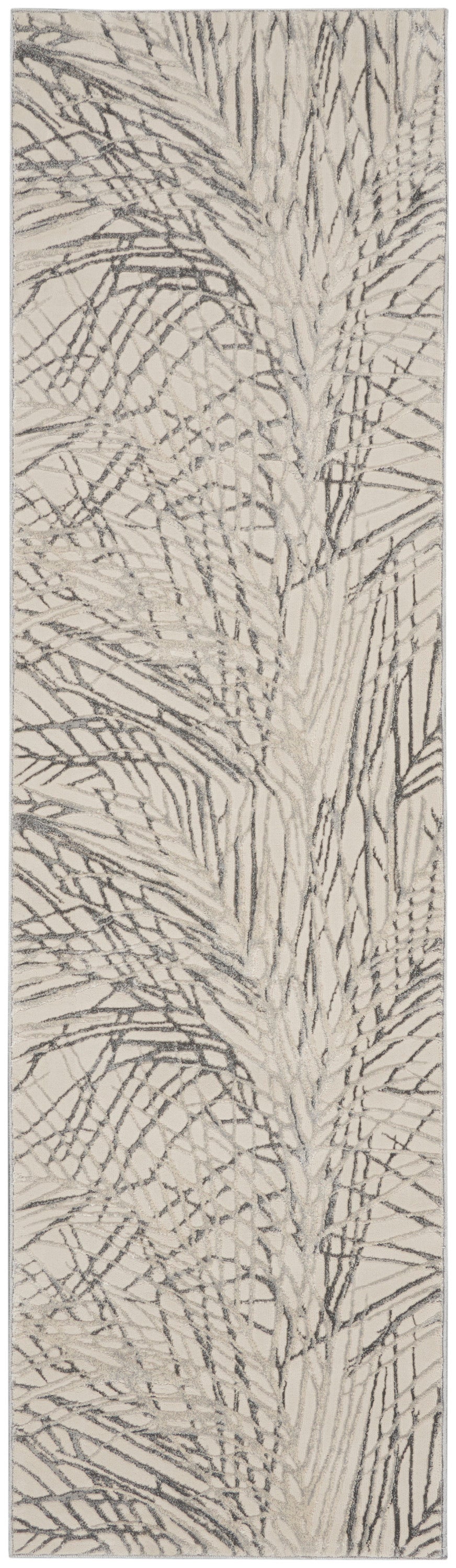 Beige runner rug with abstract gray palm frond pattern; contemporary, soft-textured look.