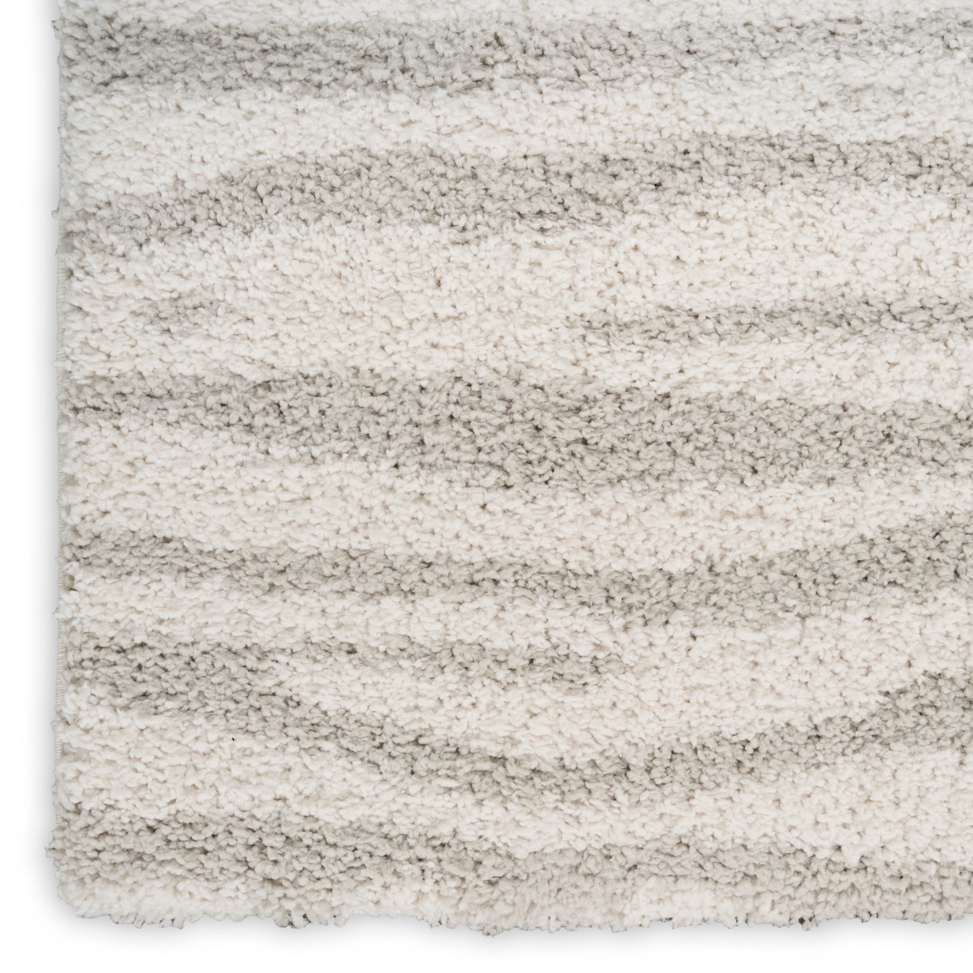 Cream & light gray striped shag rug, plush tufted pile, soft, textured surface.