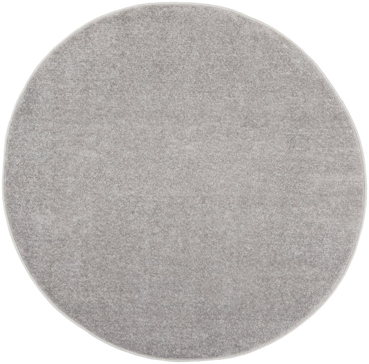 Round light gray outdoor rug with plush pile; 4' diameter, modern minimalist decor.