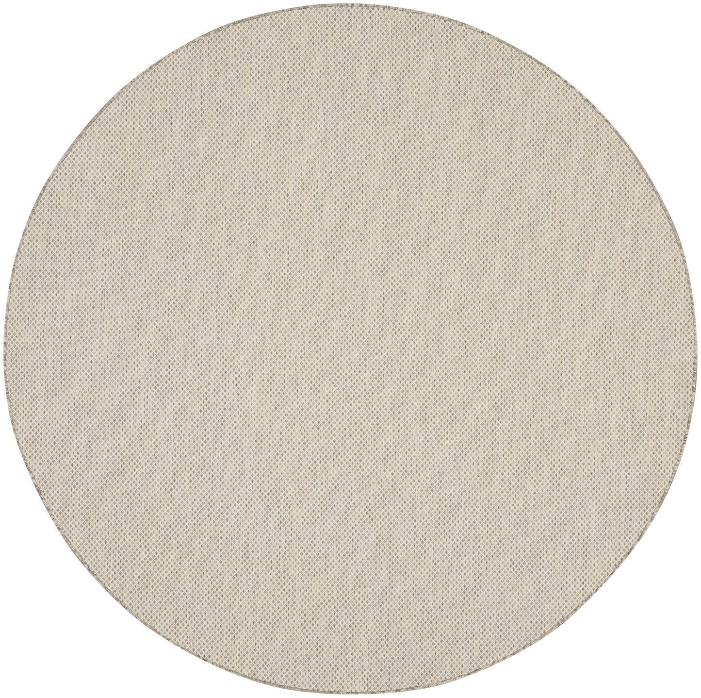 Beige round woven rug.