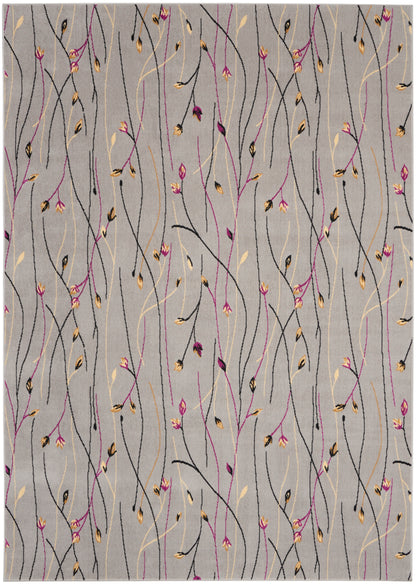 Gray woven rug with sinuous black, magenta and gold vines and small beige leaves; modern botanical pattern for living room.