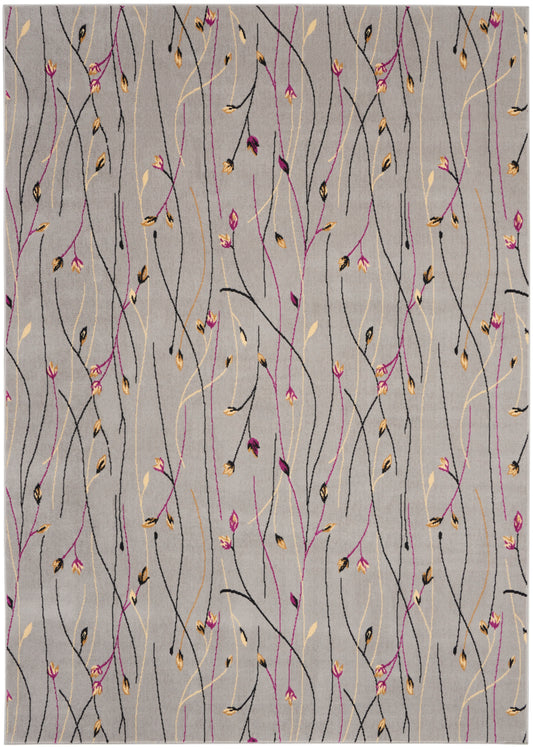 Gray woven rug with sinuous black, magenta and gold vines and small beige leaves; modern botanical pattern for living room.