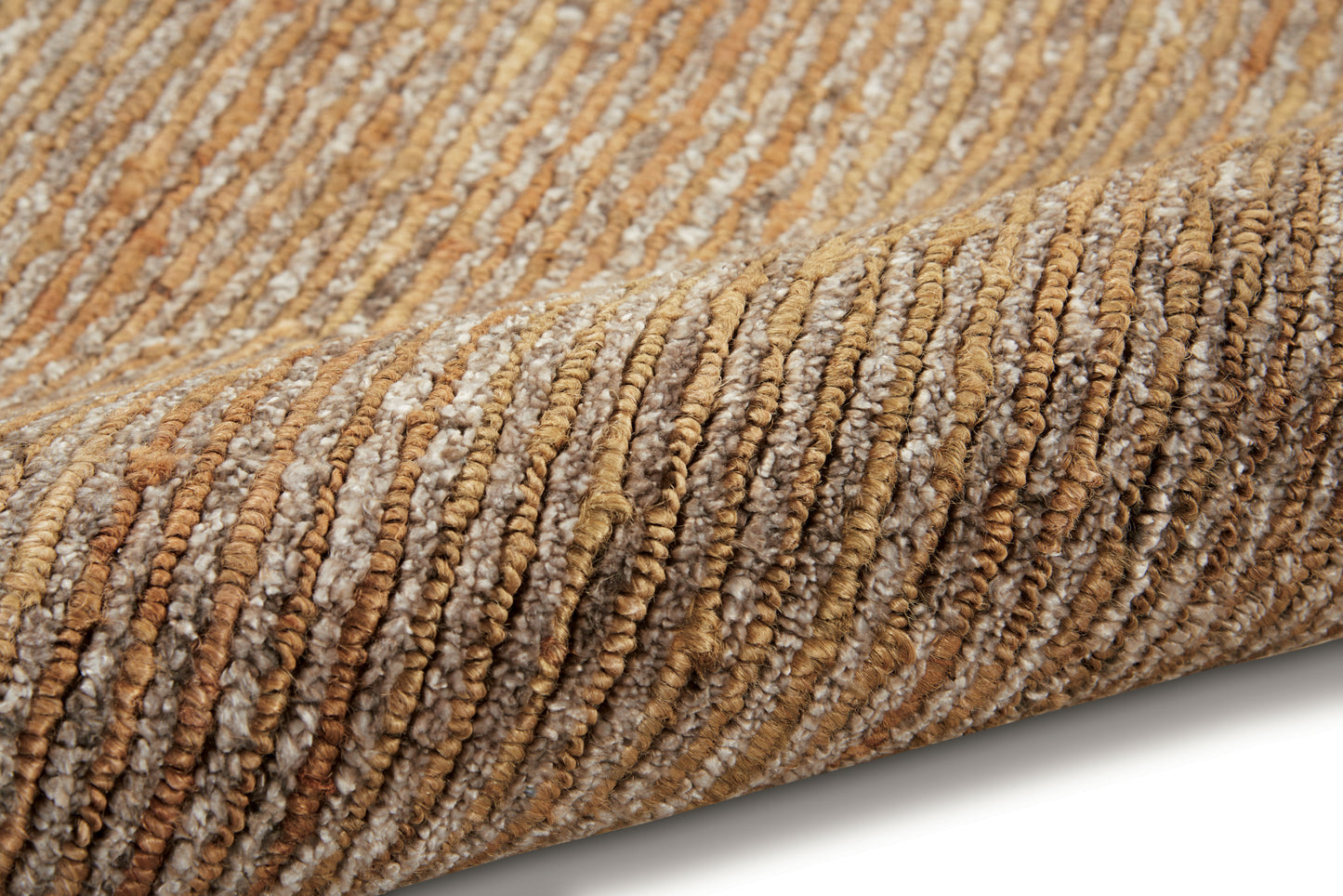 Rolled ribbed rug in warm beige and brown tones, looped texture with natural jute-like fibers.