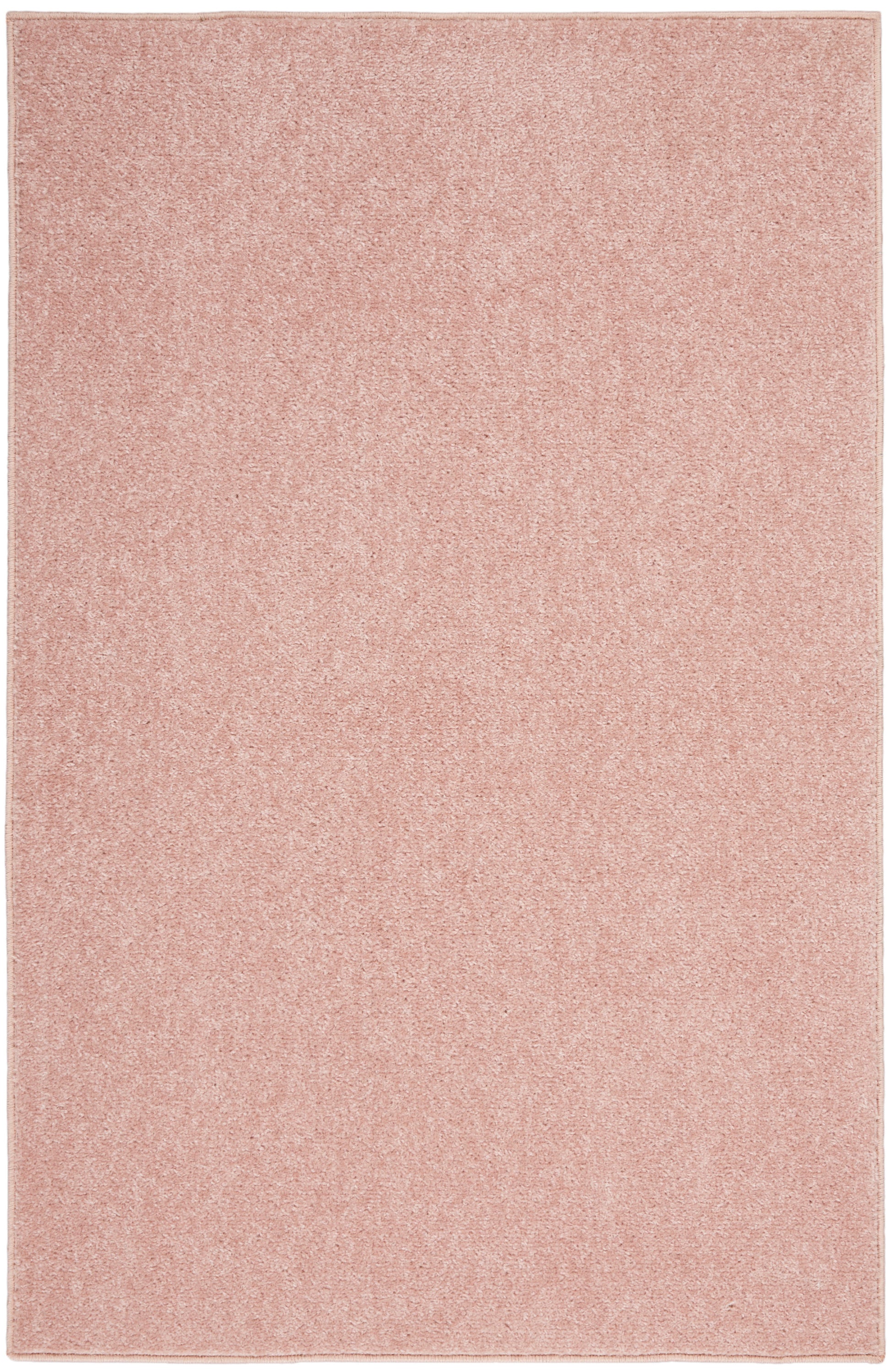 Soft pink rectangular outdoor rug with even pile texture, 2' x 4'.