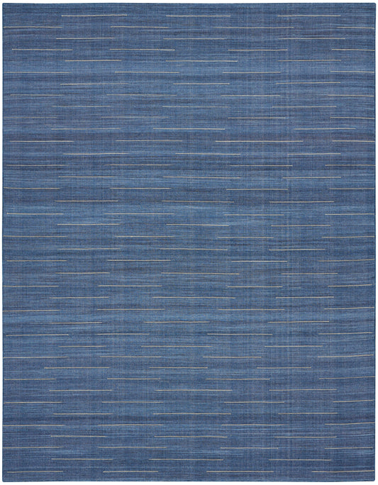 Blue flat-weave rug with narrow cream horizontal lines for a modern, textured look.