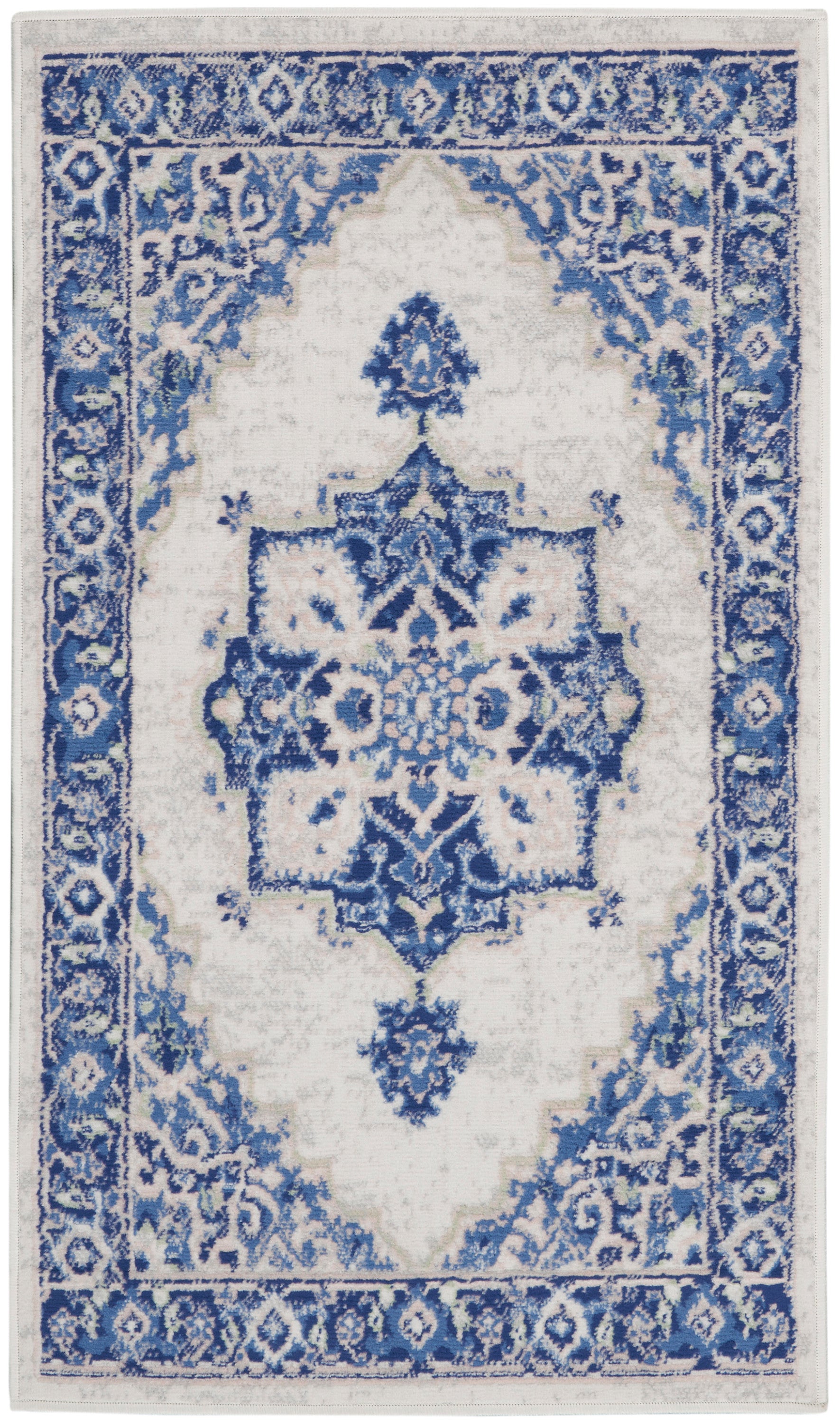 Blue and white oriental rug with intricate floral border and central medallion, distressed look, rectangular area rug.
