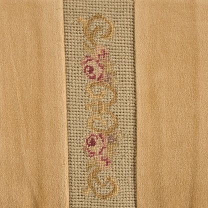 Beige textile with a narrow central woven panel featuring gold and pink scrolling floral motif.
