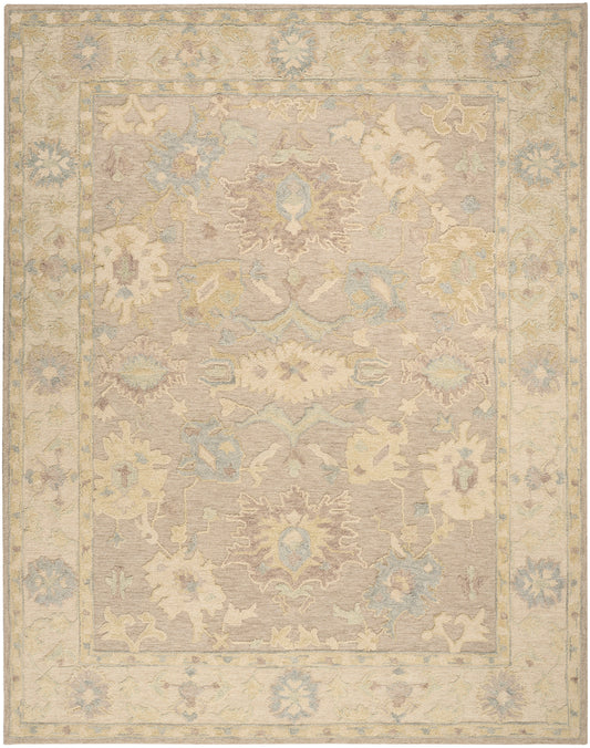 Pastel-toned oriental rug with central medallion, cream field, soft pink and pale blue detailing, and decorative border.