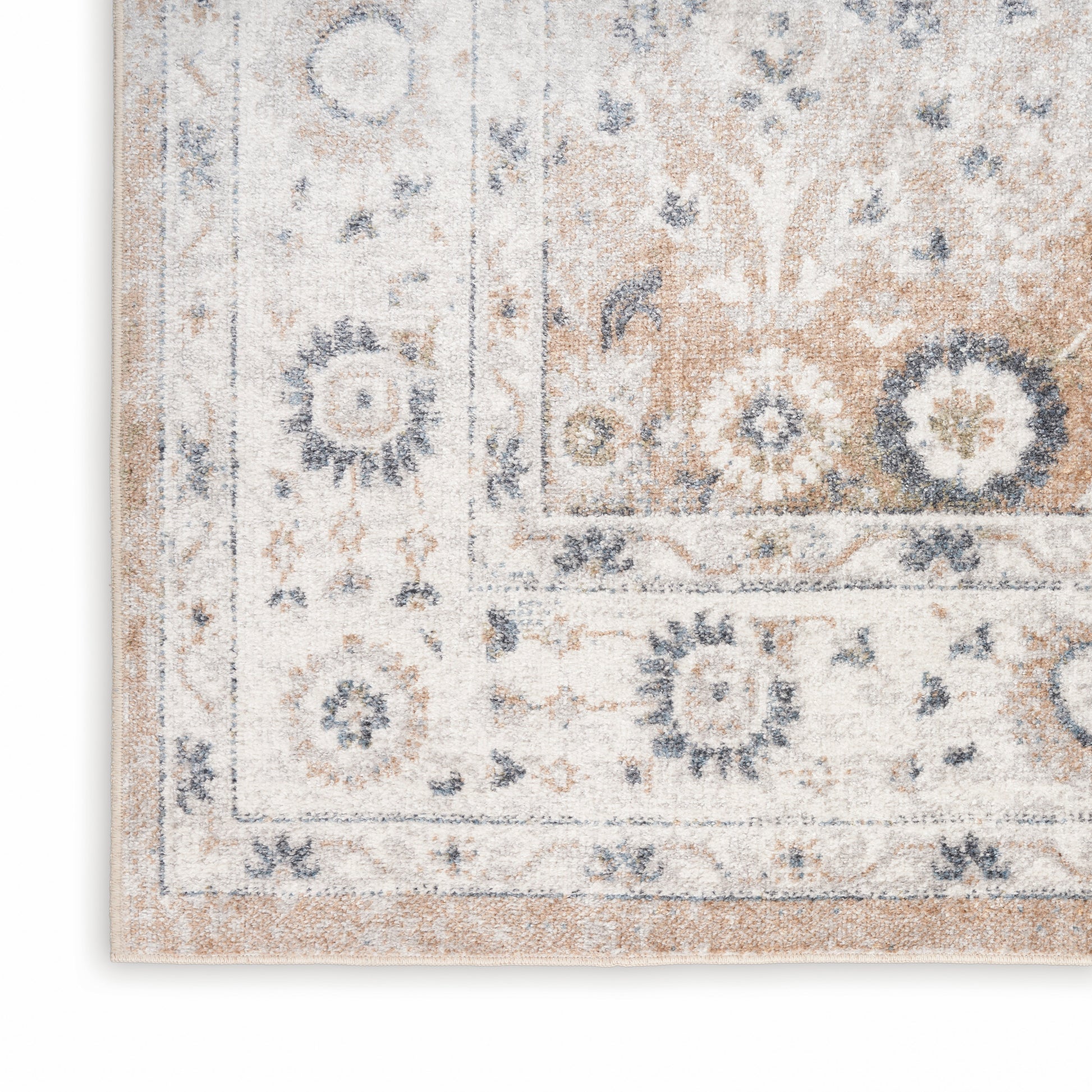 Distressed ivory and blue oriental runner rug with floral medallions and decorative border.