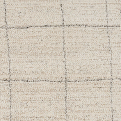 Beige textured rug with a thin dark gray grid pattern in a square motif, soft plush pile, 9' x 12'.