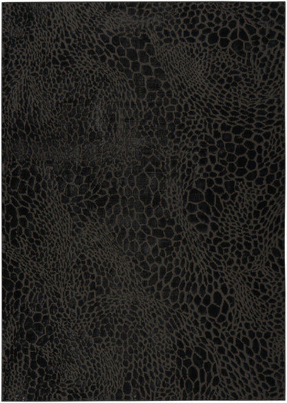 Black rug with a crocodile-style reptile-skin pattern and embossed textured surface; 6' x 9'.