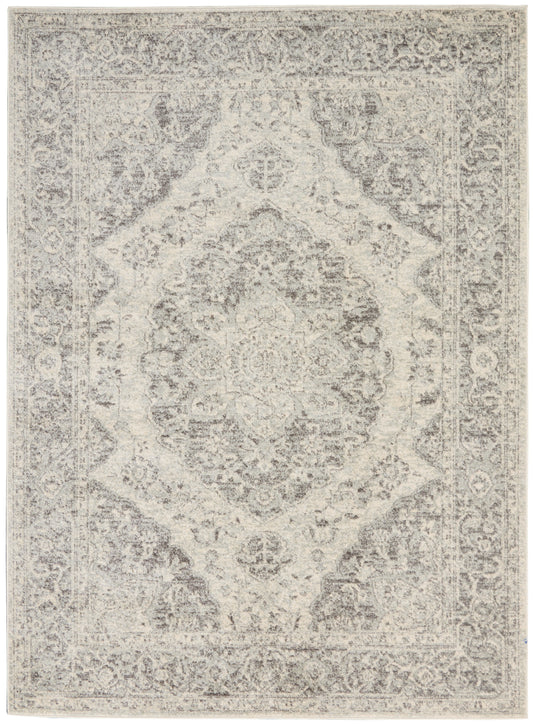 Neutral-toned oriental rug featuring a vintage central medallion and ornate border in gray-beige hues.