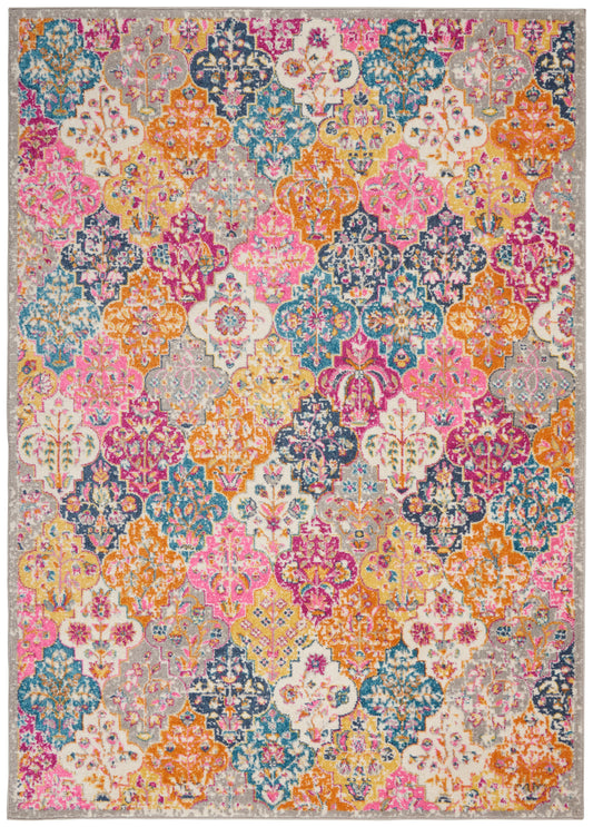 Rectangular area rug with a vibrant multicolor damask floral pattern in pink, orange, teal, navy and ivory.