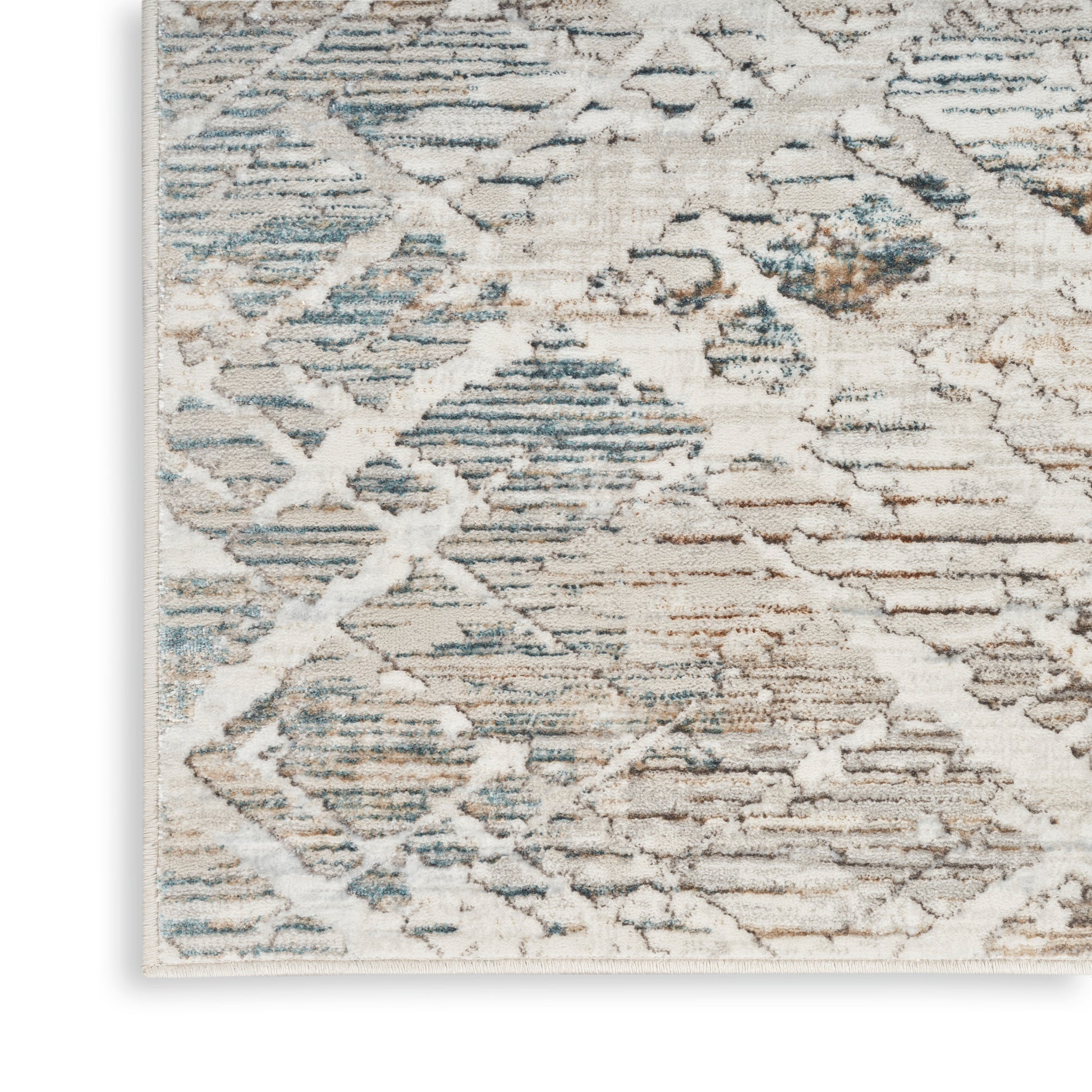 Light blue, cream, and taupe distressed geometric runner rug with diamond motif and soft woven texture.