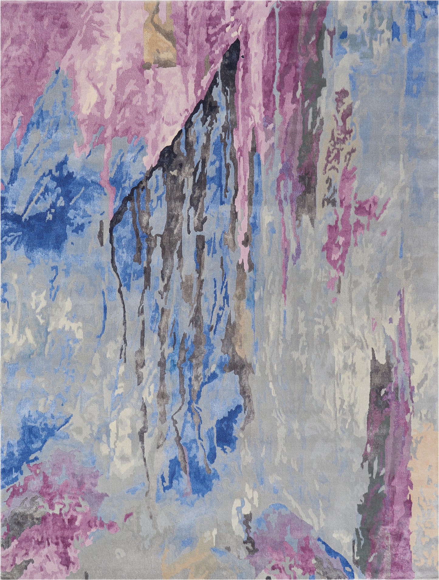 Abstract area rug with pink, lavender, blue and gray hues; jagged painterly pattern for modern living spaces.