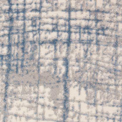 Blue and beige abstract rug with a weathered grid pattern; soft pile ideal for living room decor.