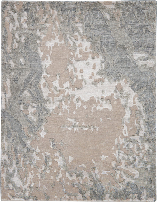 Rectangular abstract area rug in muted beige, taupe & gray with a distressed pattern and plush pile.
