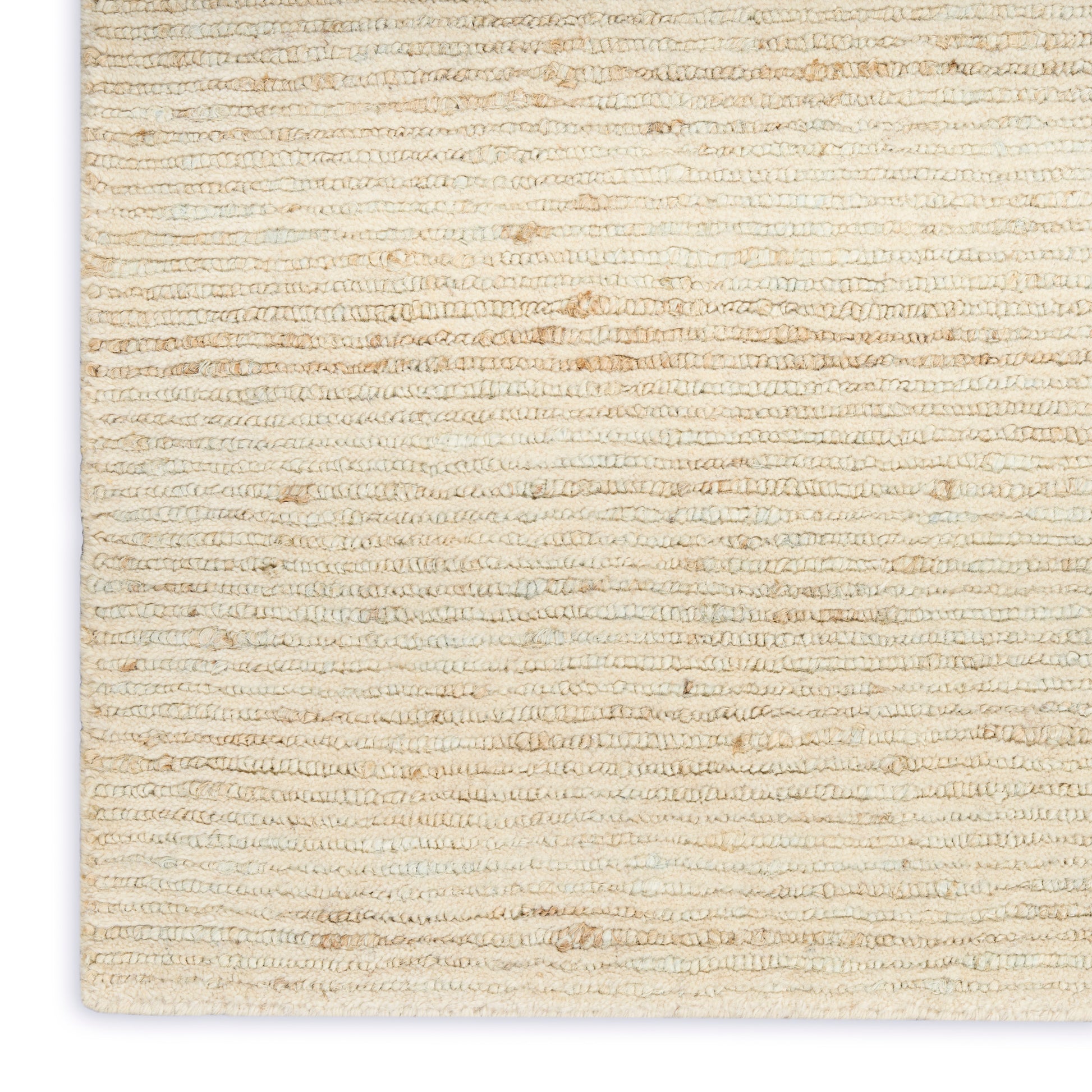 Cream boucle woven rug with looped texture and beige undertones, soft neutral floor mat for living spaces.