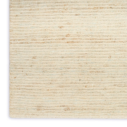 Cream boucle woven rug with looped texture and beige undertones, soft neutral floor mat for living spaces.
