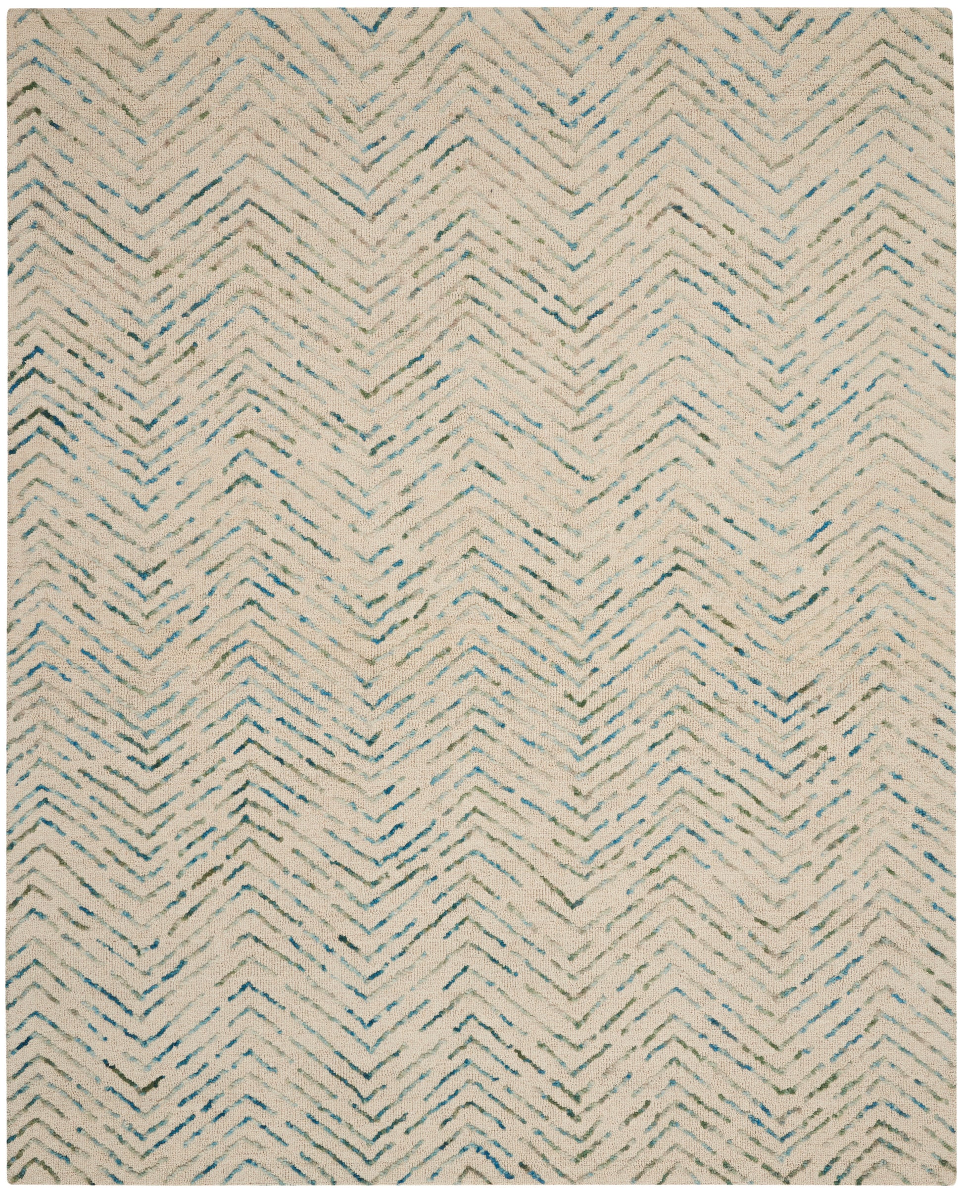 Beige rug with a subtle blue-gray chevron pattern and a soft woven texture.