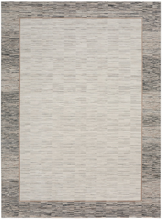 Rectangular area rug with cream center, thin tan border, and wide textured gray outer border; modern, transitional style.