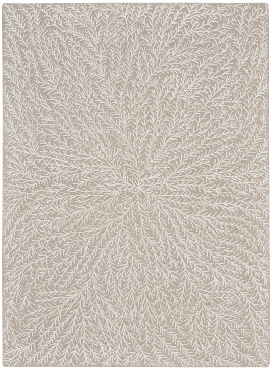 Beige area rug with white branching pattern radiating from the center.
