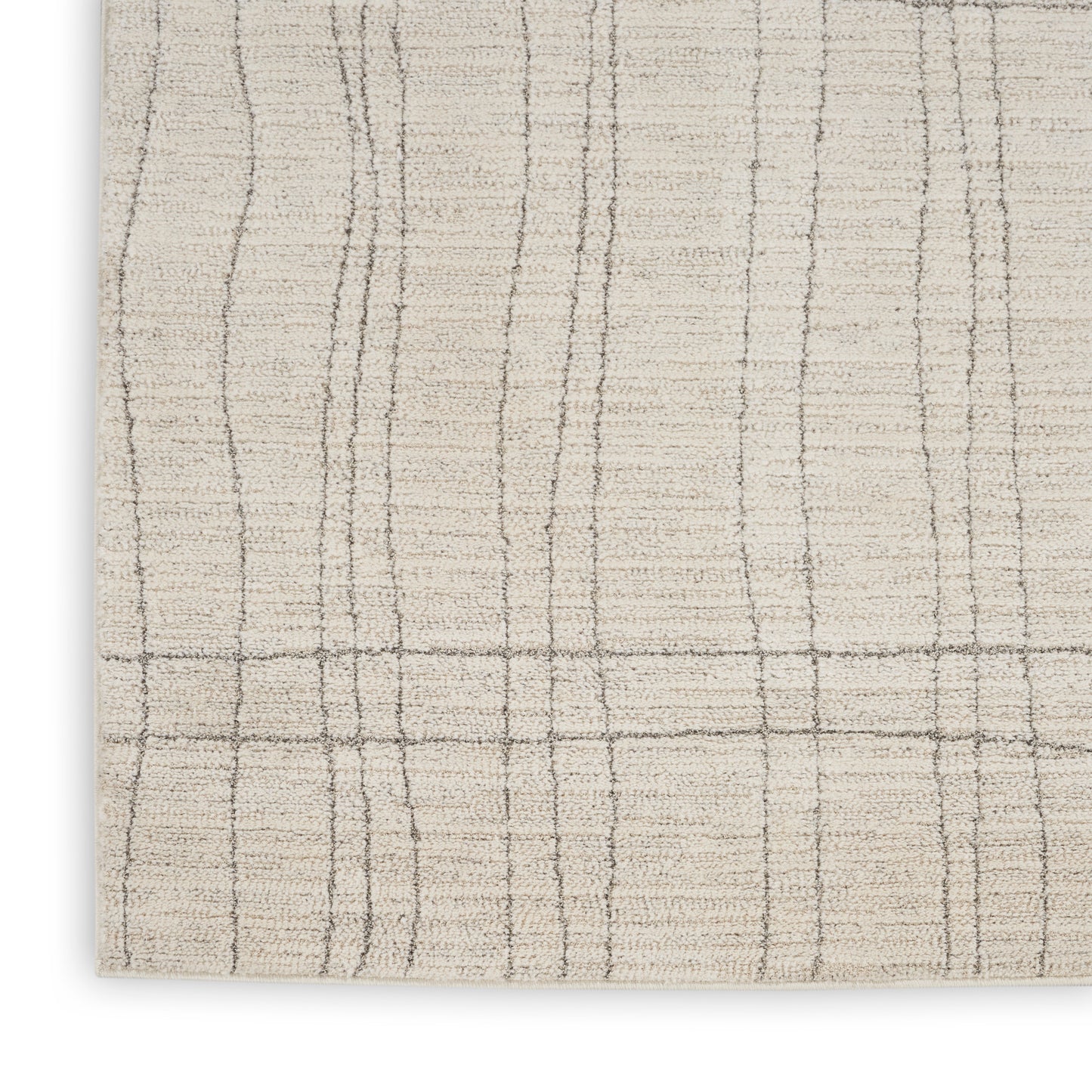 Cream rug with taupe vertical and horizontal lines forming a plaid grid, soft textured pile.