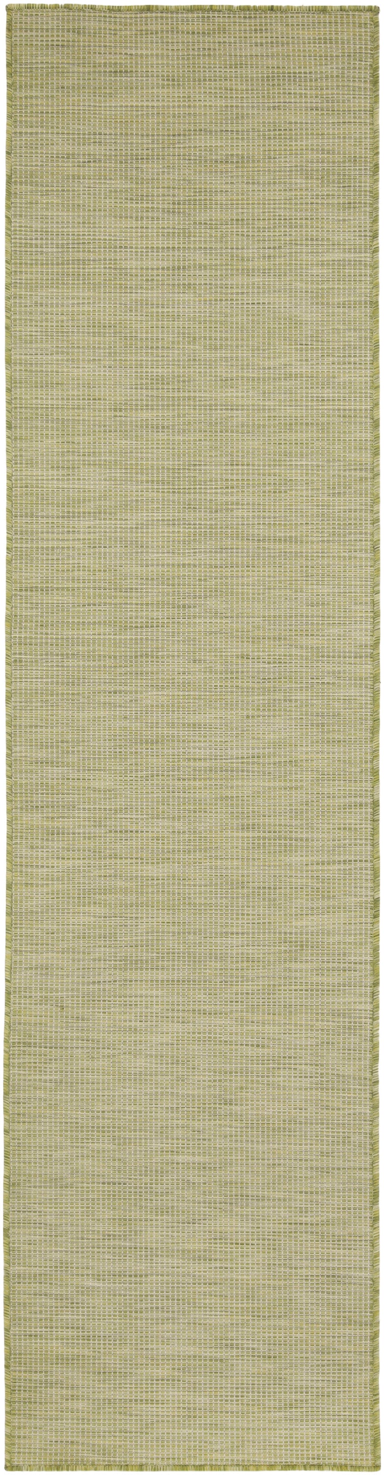 Long sage-green woven rug runner with subtle grid texture and matching border.