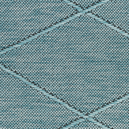 Close-up of teal-blue woven fabric with diamond lattice pattern and textured weave; ideal for rug or upholstery.