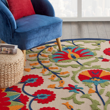Round rug with a vibrant floral pattern; 8' diameter.