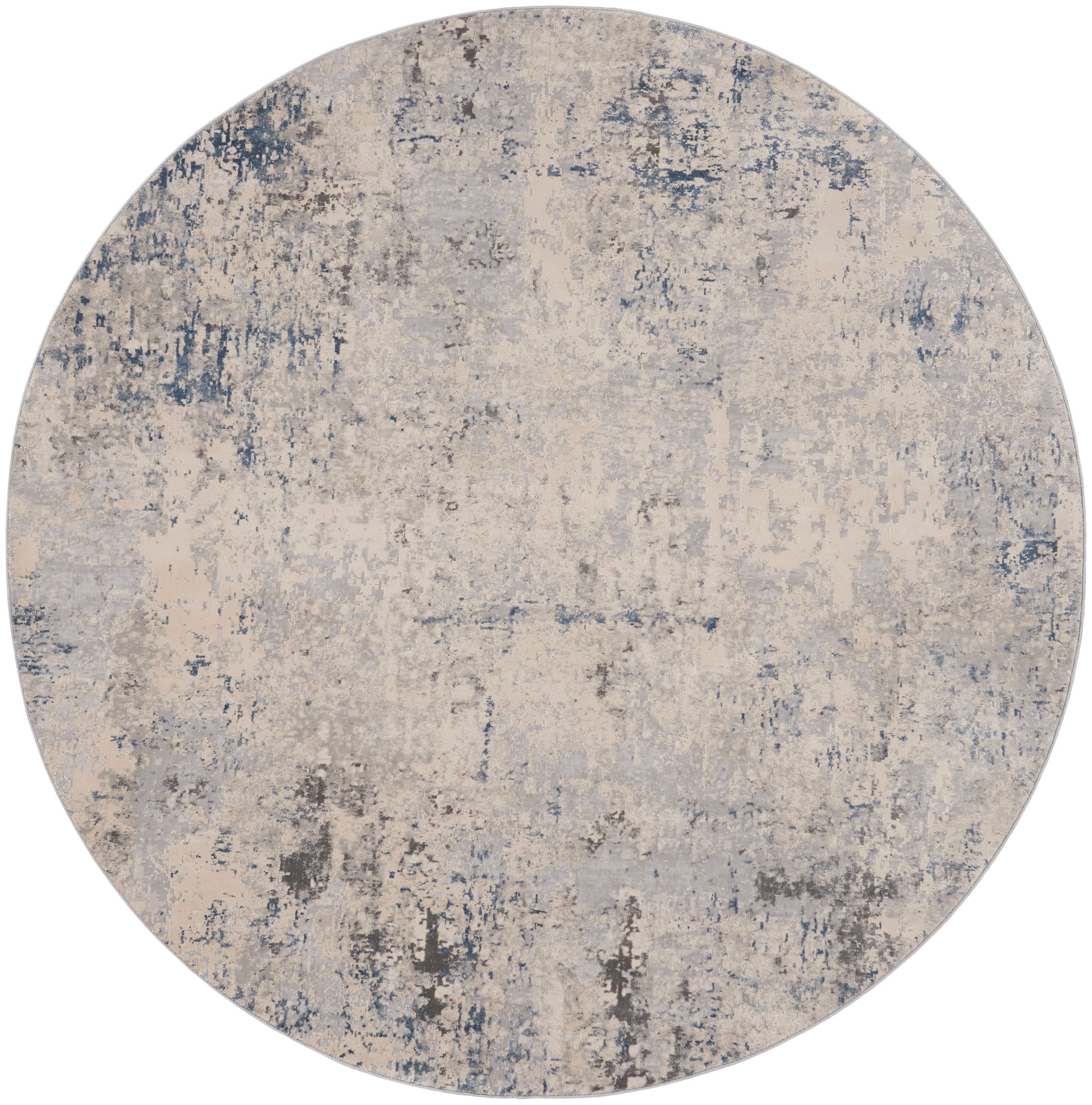 Round area rug with abstract distressed beige and blue-gray pattern for a vintage-modern living space.