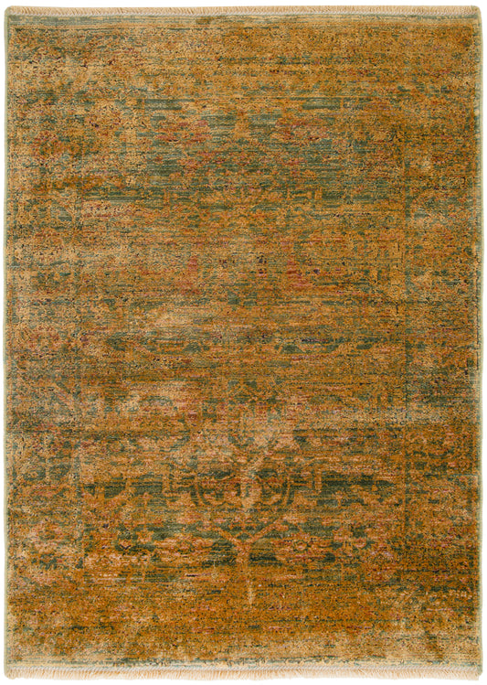Vintage-style rectangular rug in warm orange and olive with teal accents and a faded intricate pattern, fringe edges.
