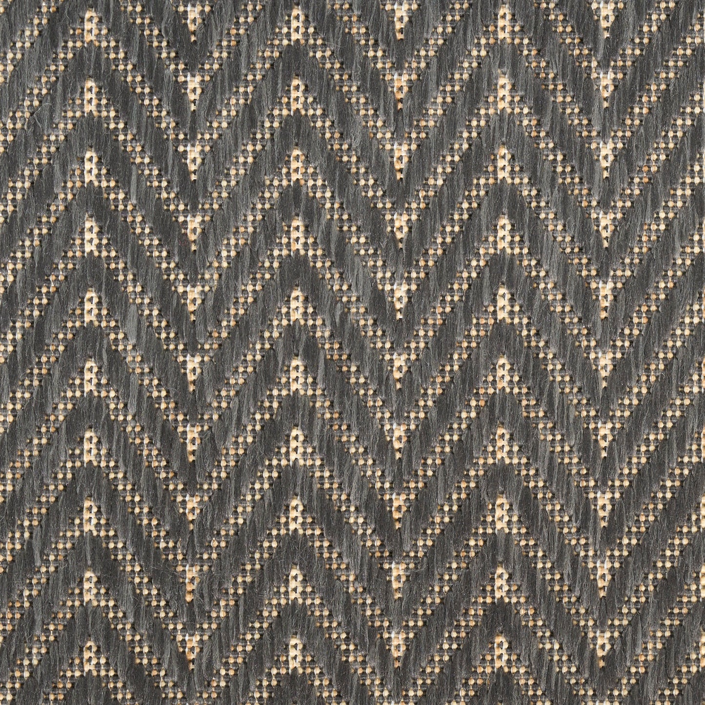 Gray chevron-patterned rug runner with cream dotted accents; textured jacquard weave.