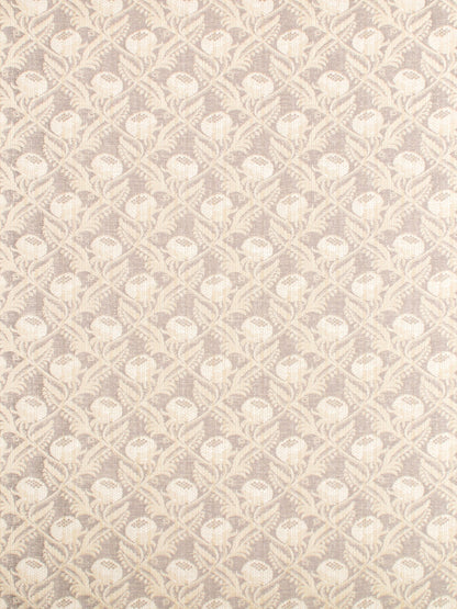 Cream jacquard fabric with beige shell-like motifs in a repeating lattice pattern; woven upholstery/drapery textile.